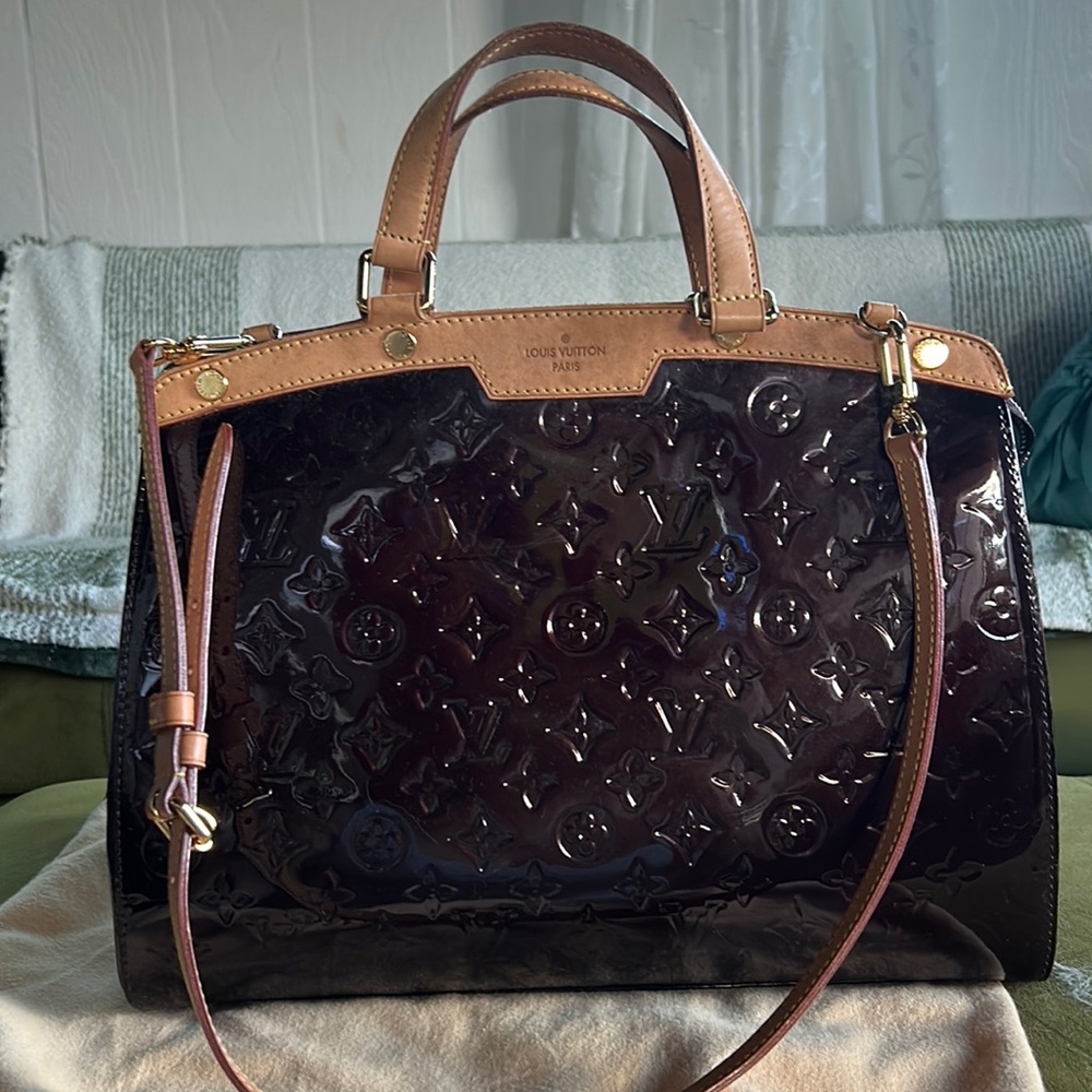 Louis Vuitton Brea GM in color Vernis Amarante.